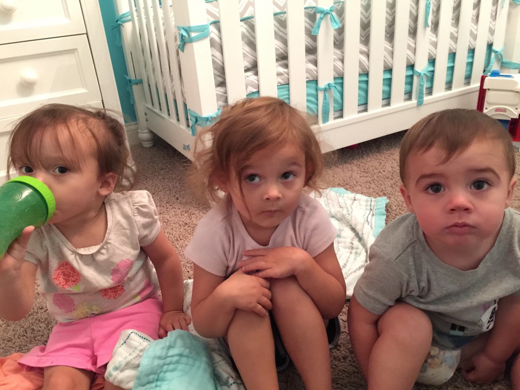 Three of my grandchildren getting ready for story time.