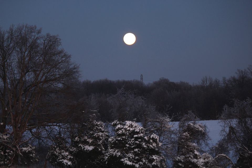 full moon over snow