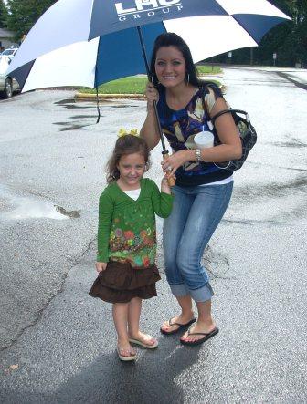 This is my beautiful daughter and granddaughter as we arrived. Thank goodness we brought an umbrella!