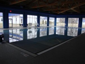 Indoor pool with zero grade entry, aqua lift and warming room