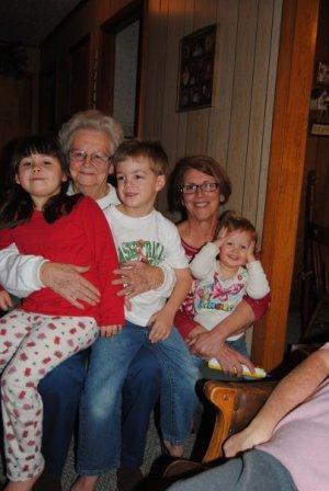 Joy, daughter Johanna (Kelly Jo's mom) holding their three grandchildren