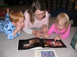 Amy reading to her grandchildren