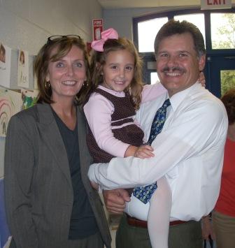 Bill and I with Abby last year on Grandparent's Day