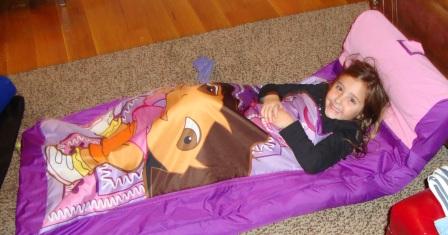 Here's one reason I need to take care of myself! She loves her Dora sleeping bag.