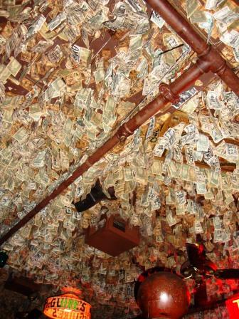 These are dollar bills that hang from the ceiling at one of the restaurants where we ate.