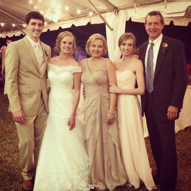 Left to right: Groom, bride, mother of the bride, bride's sister, and bride's father.