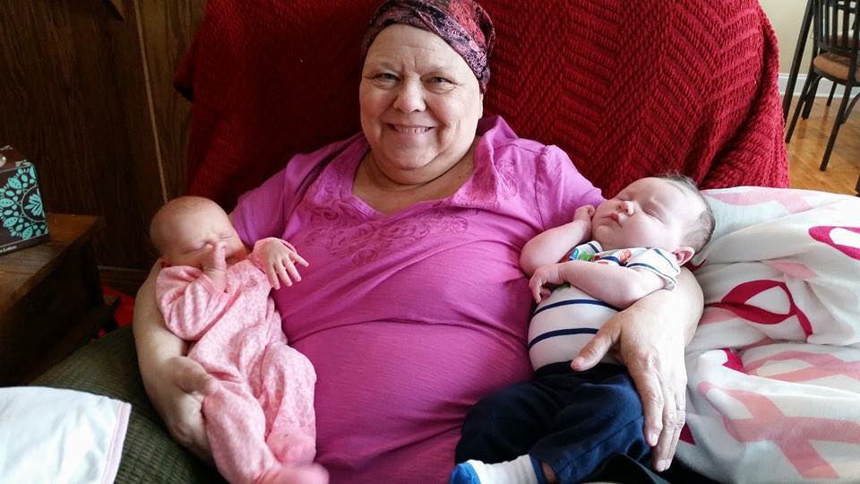 Kathy with two of her precious grandbabies!
