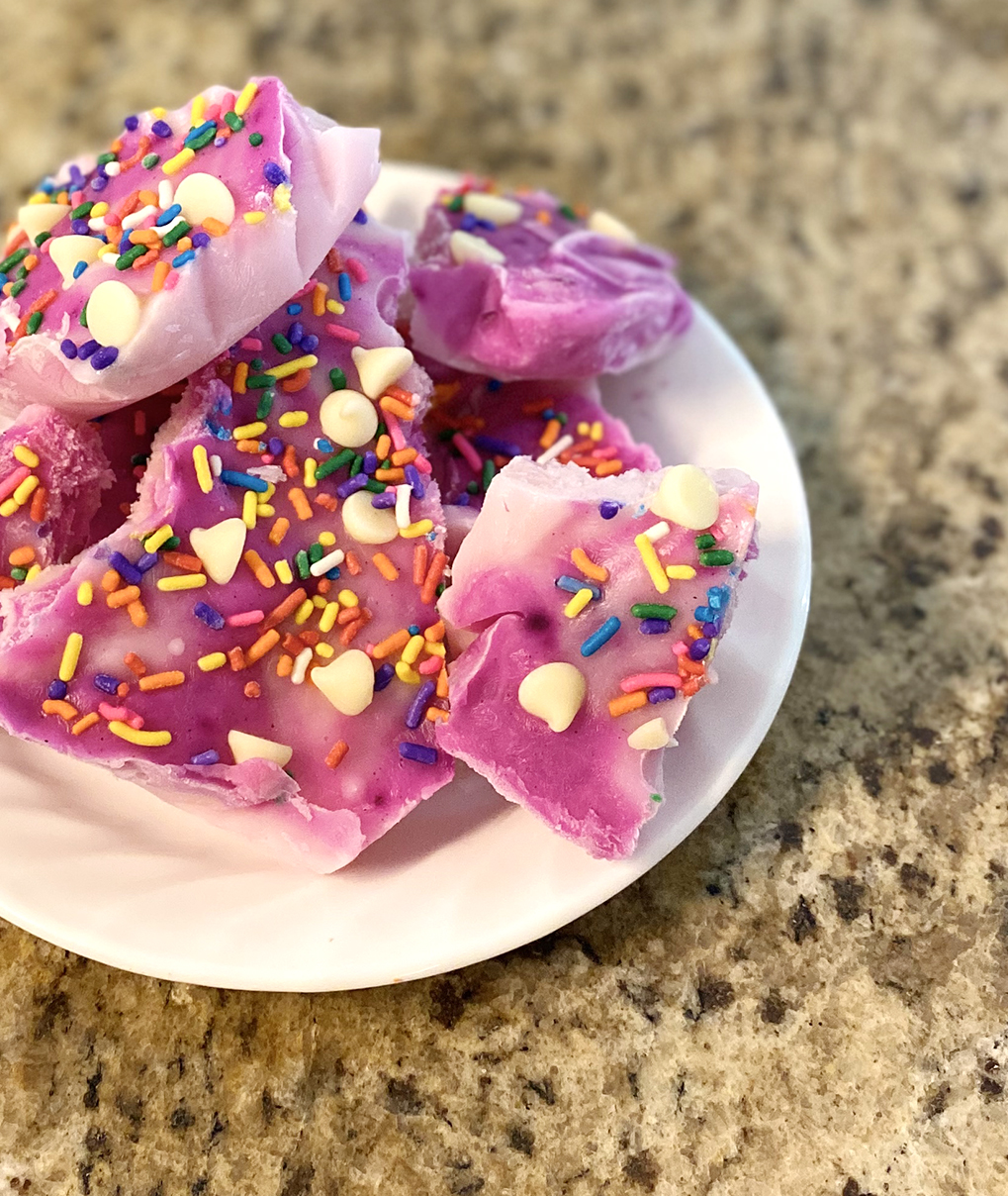 purple frozen yogurt bark and sprinkles