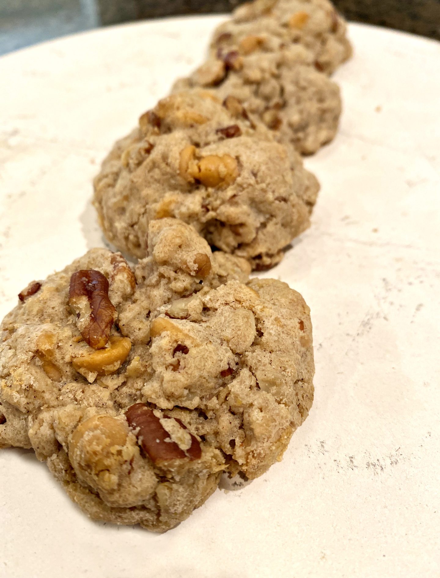 buttermilk cookies with pecans and butterscotch chips in a row