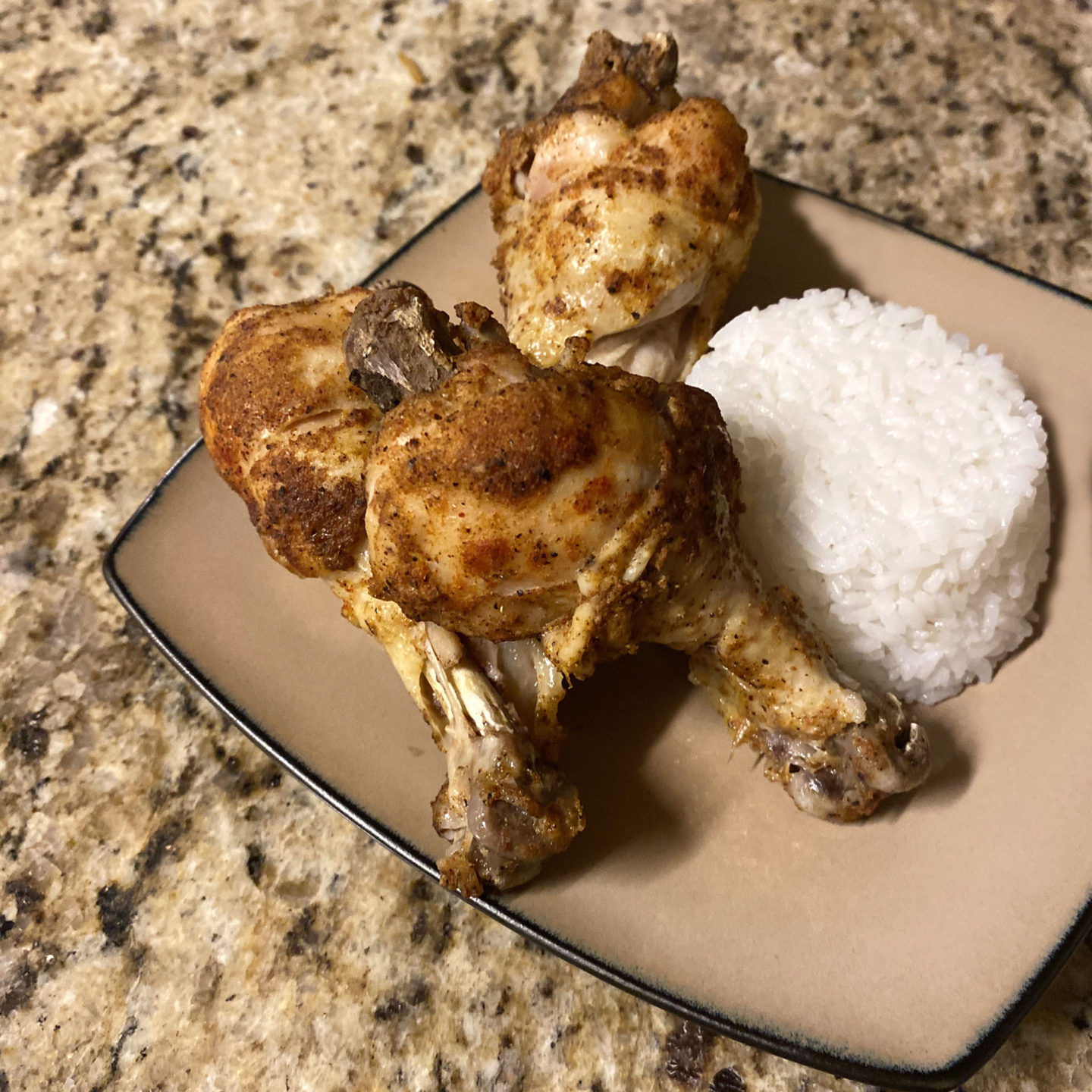 chicken drumsticks and steamed rice
