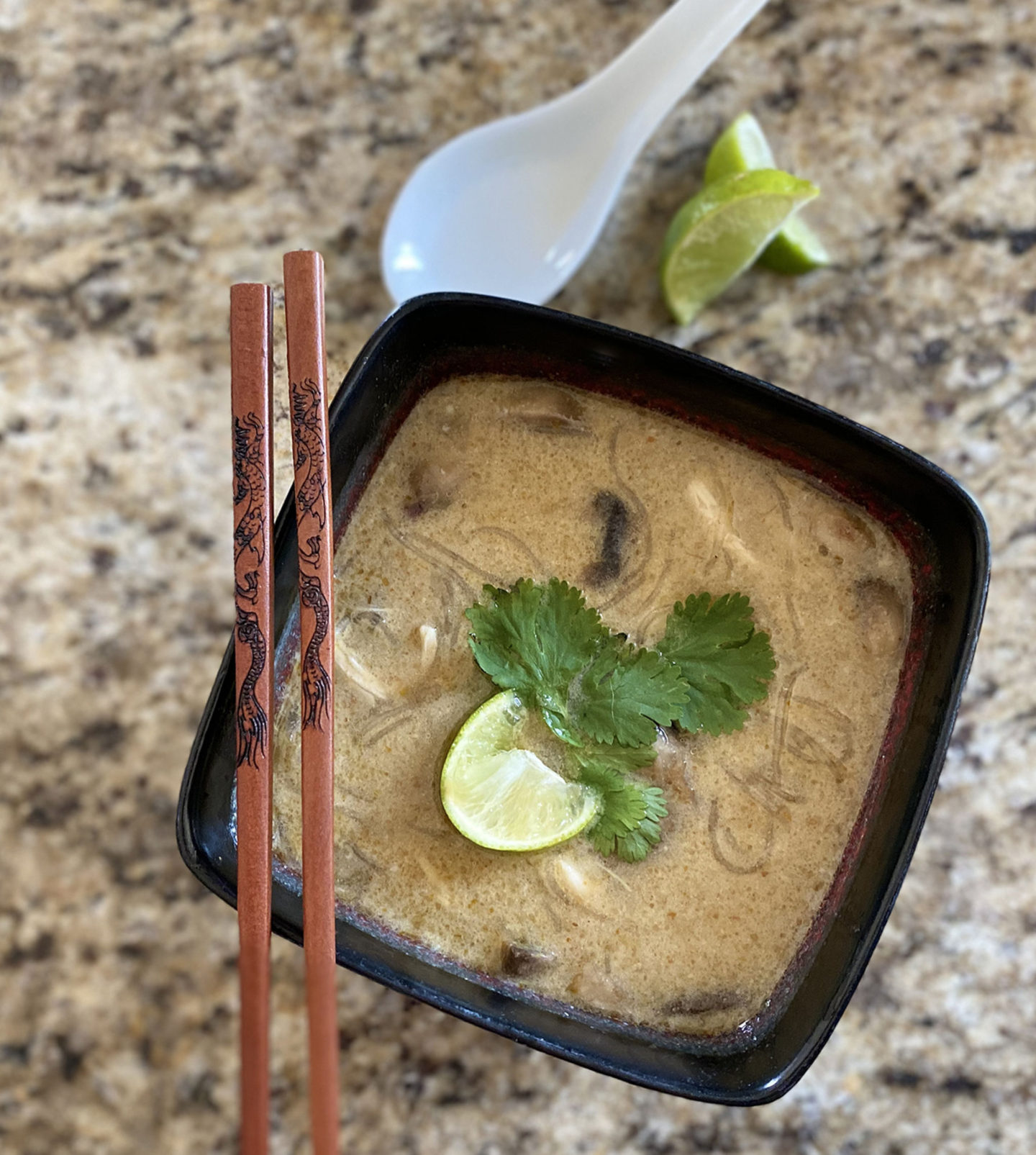 coconut lime curry soup in bowl from top view