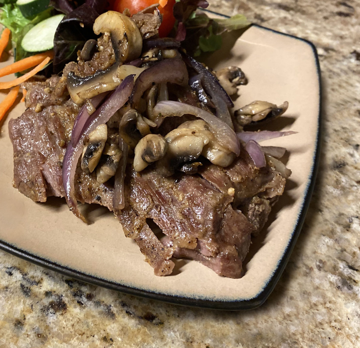 skirt steak with sauted mushrooms and onions