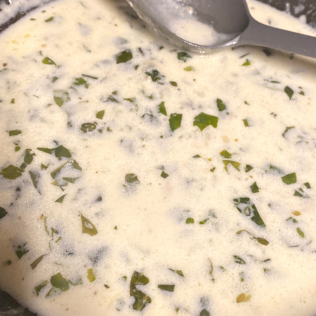 close up of lemon cream and spinach sauce