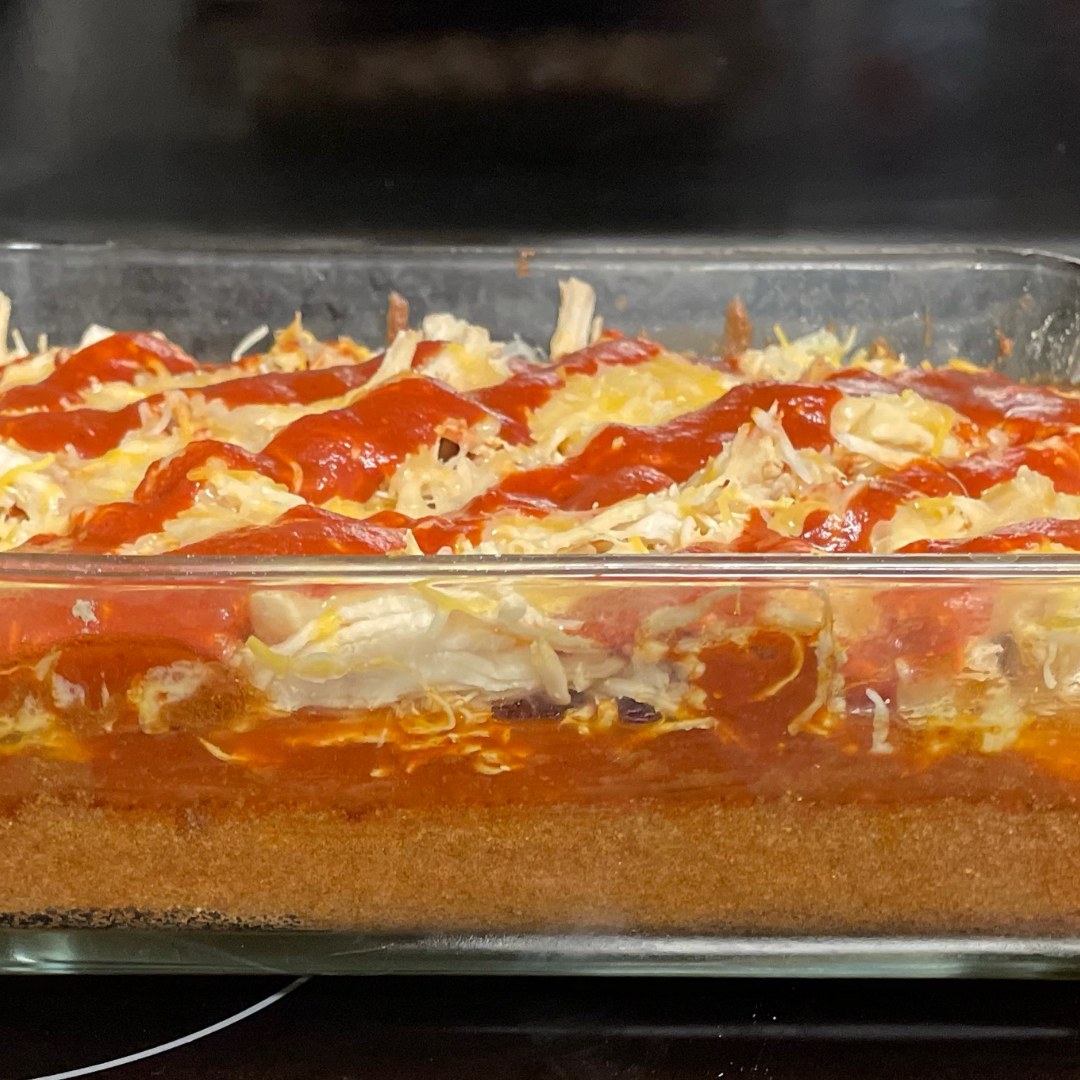 side view of layers of open faced chicken enchilada
