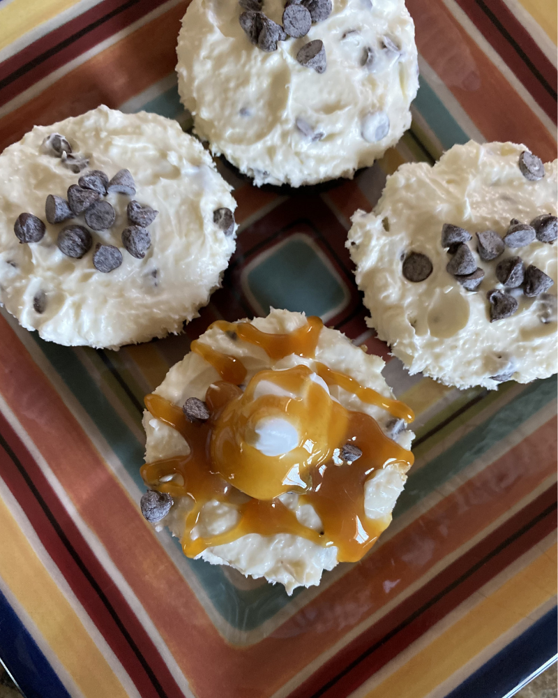 top view of mini chocolate chip cheesecakes on a plate