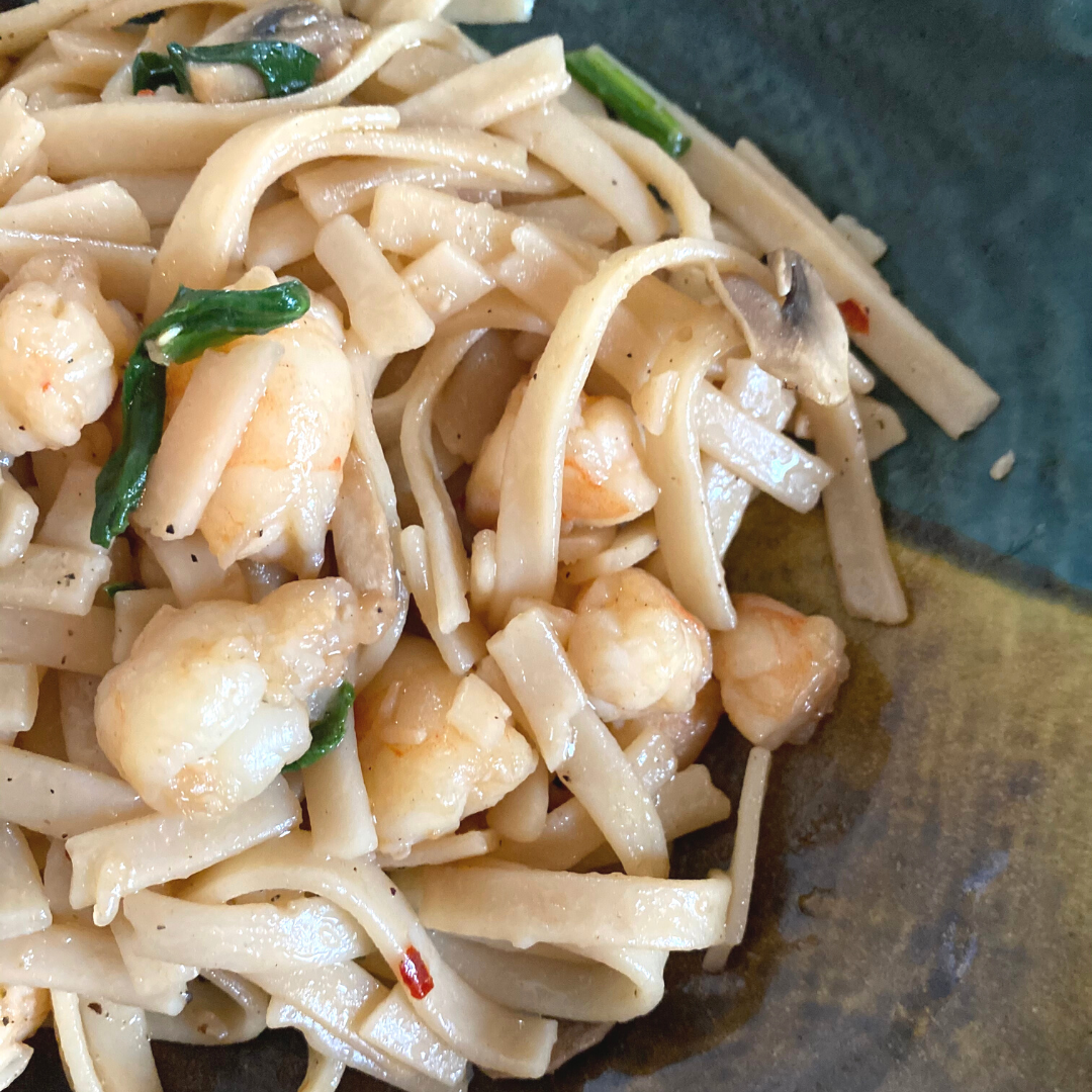 close up of shrimp and vegetable fettuccini 