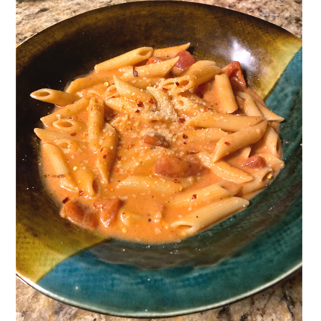 zesty tomato penne pasta in a bowl