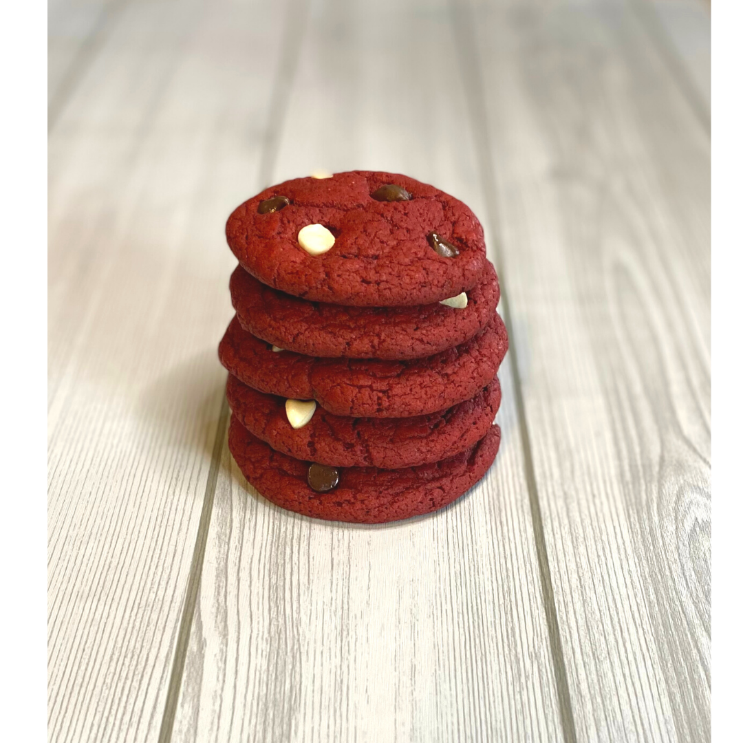a stack of red velvet chocolate chip cookies