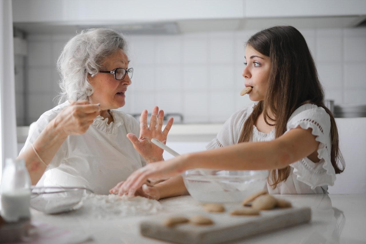 grandma and granddaughter in kitchen