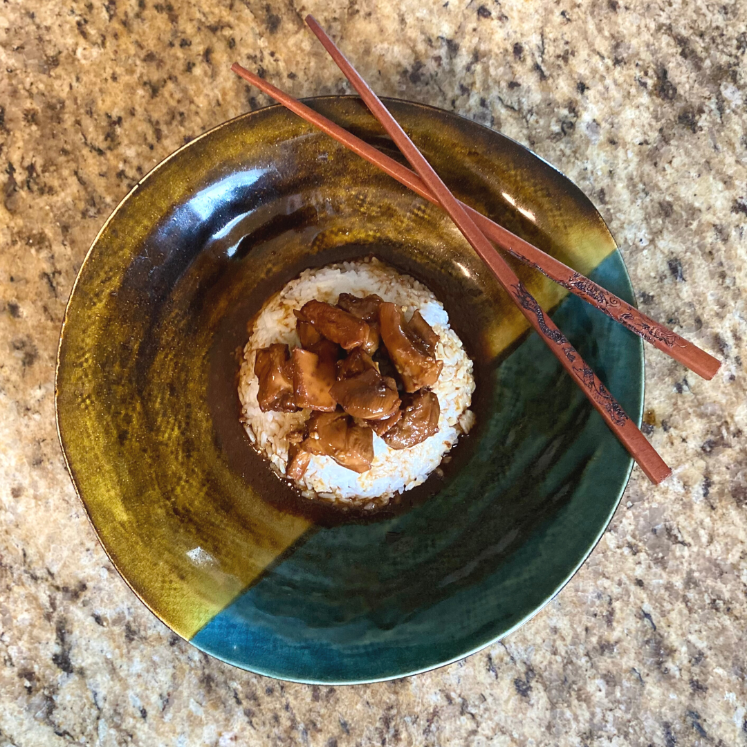 top view of teriyaki chicken and steamed rice in a bowl