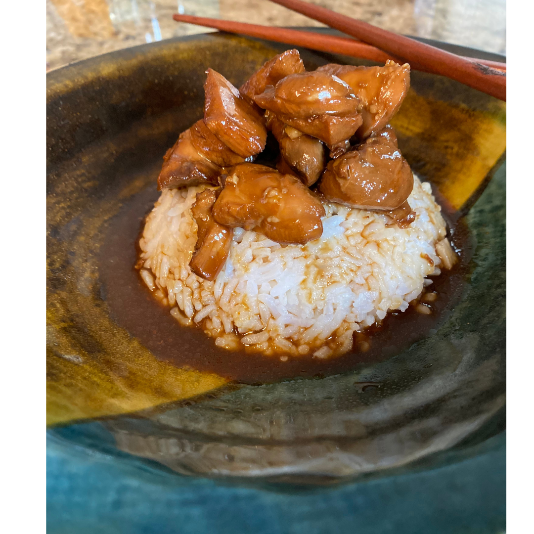 teriyaki chicken and steamed rice in a bowl