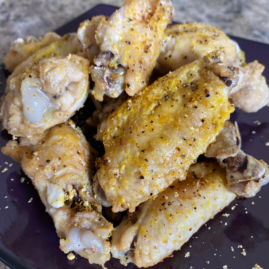 lemon pepper chicken wings on a plate
