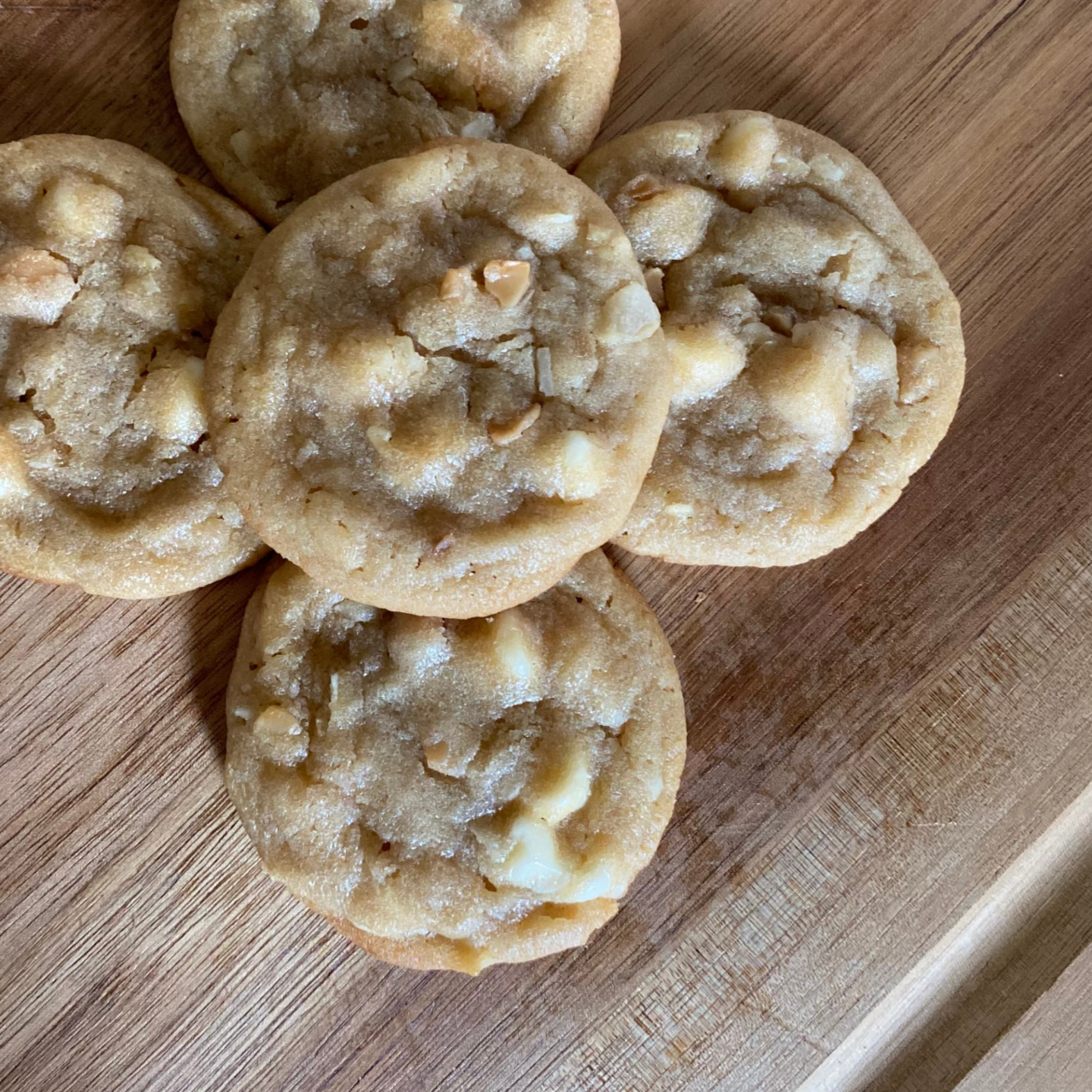 top view of 5 white chocolate chip macadamia nut cookies