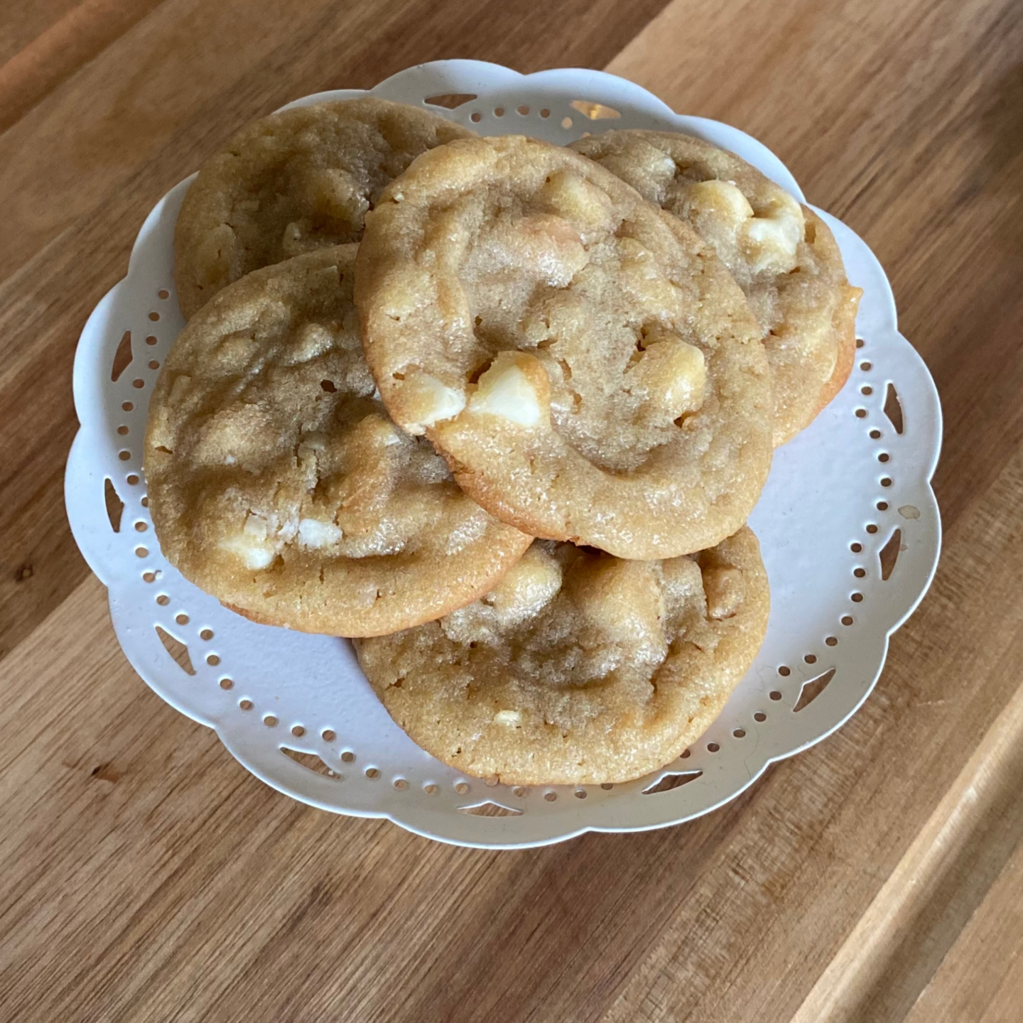 white chocolate chip macadamia nut cookies on a white dish