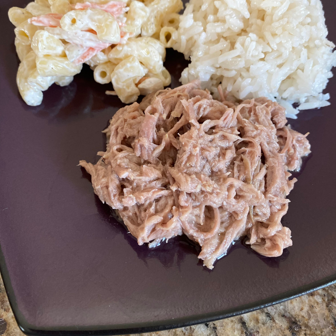 hawaiian kahlua pork rice and hawaiian macaroni salad on plate