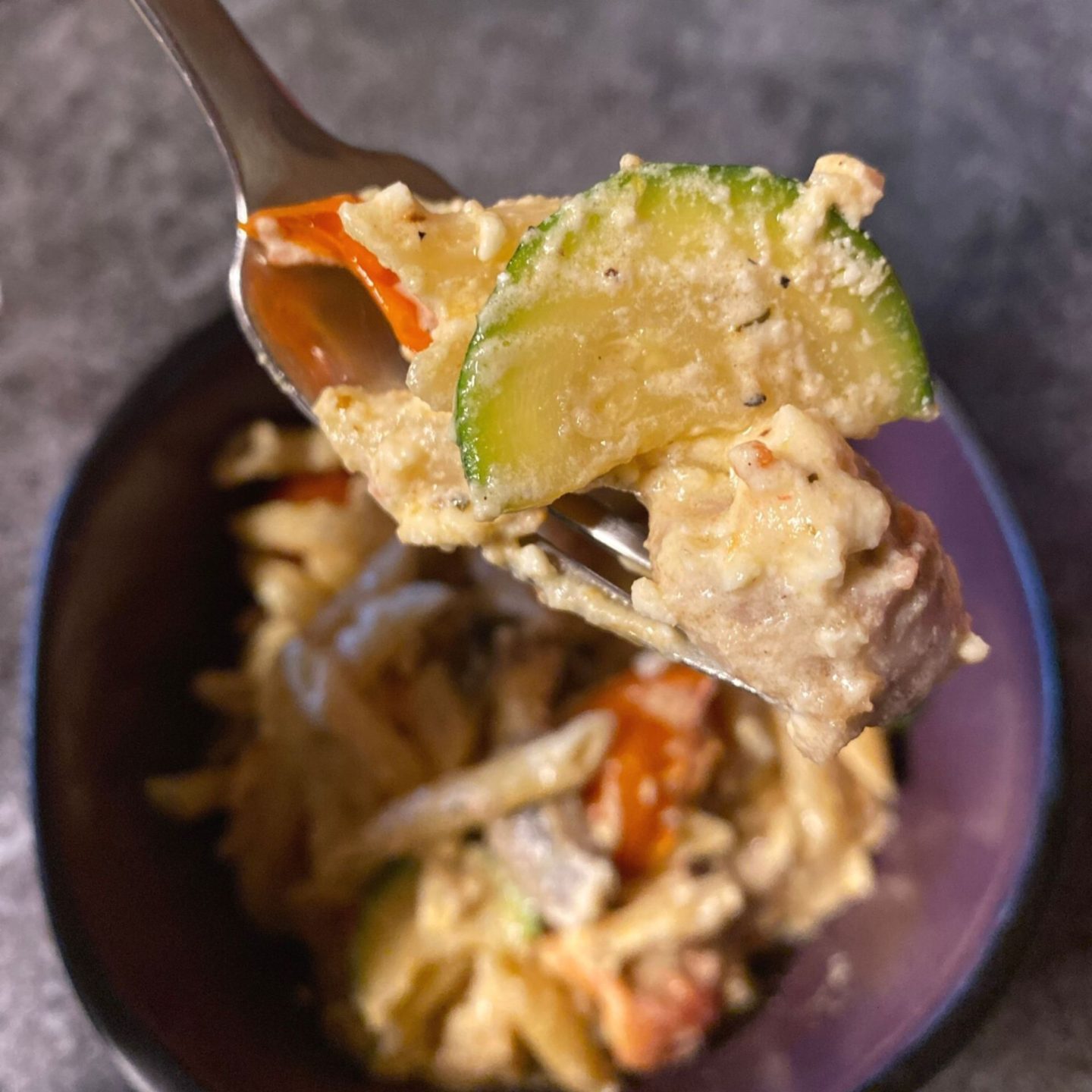 Chicken Vegetable feta pasta on a fork