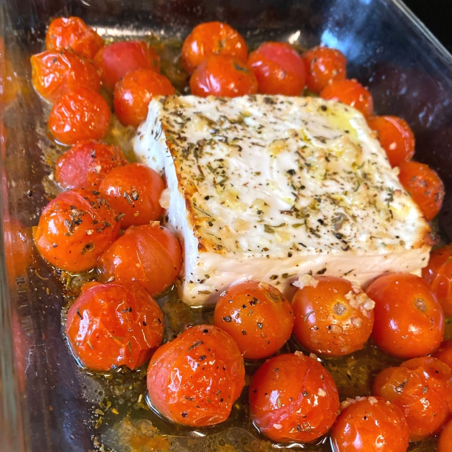 block of feta and cherry tomatoes