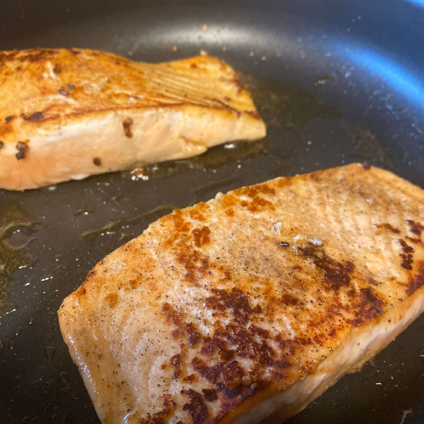 2 salmon filets in pan