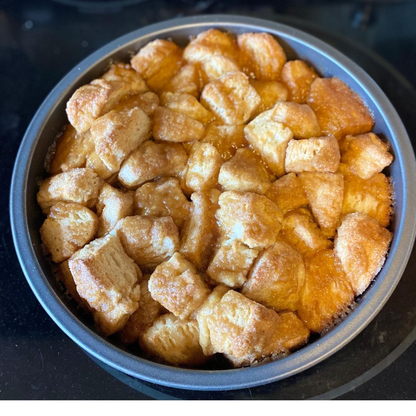 gooey monkey bread in pan out of oven