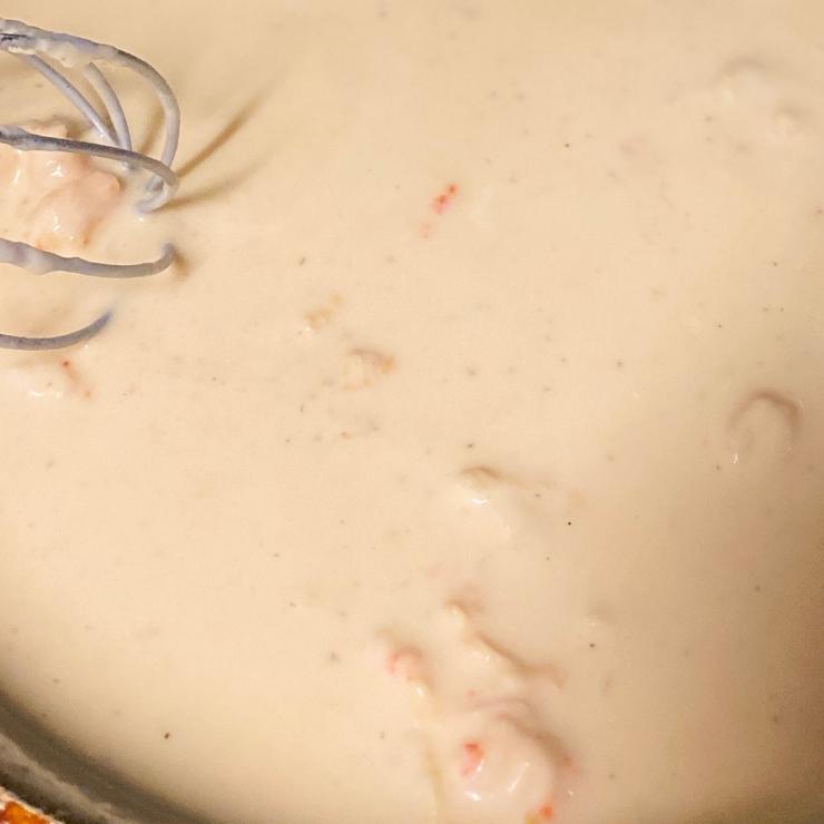 closeup of crawfish in cream sauce
