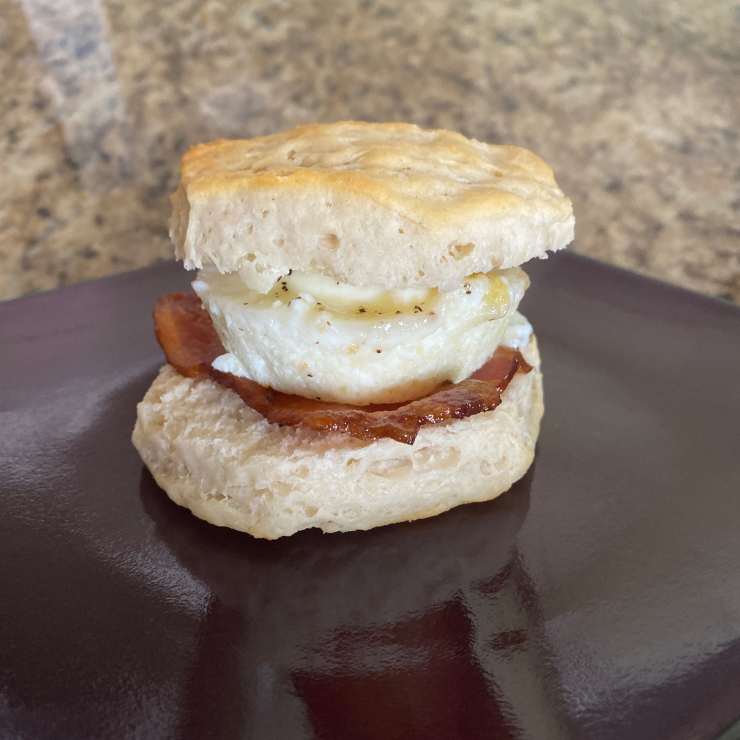 front view of egg and bacon biscuit sandwich