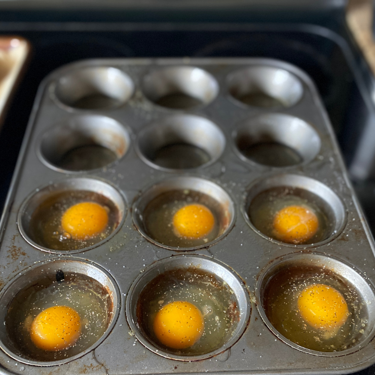 raw eggs in cupcake tin