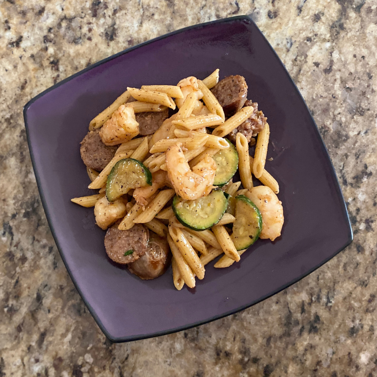 spicy Italian sausage and shrimp pasta from top view