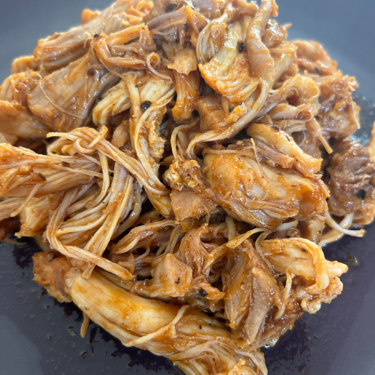 spicy shredded bbq chicken on a plate