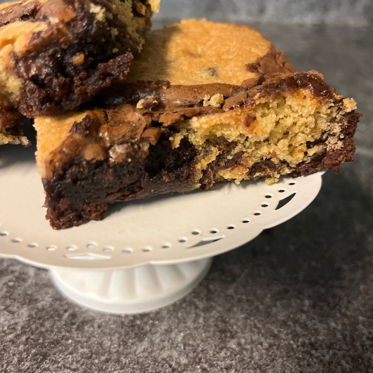 close up of chocolate chips cookie brownie bars
