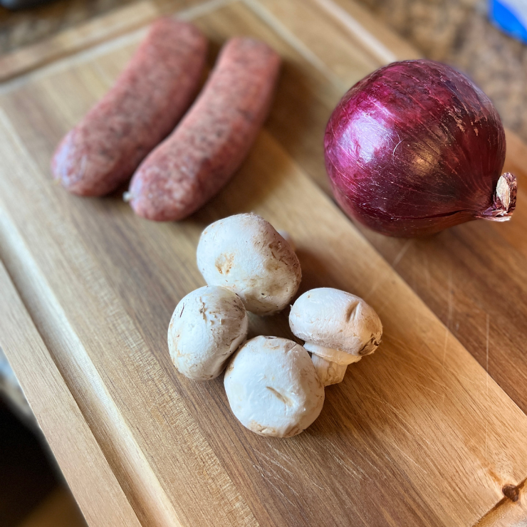 mushrooms red onion and uncooked sausage