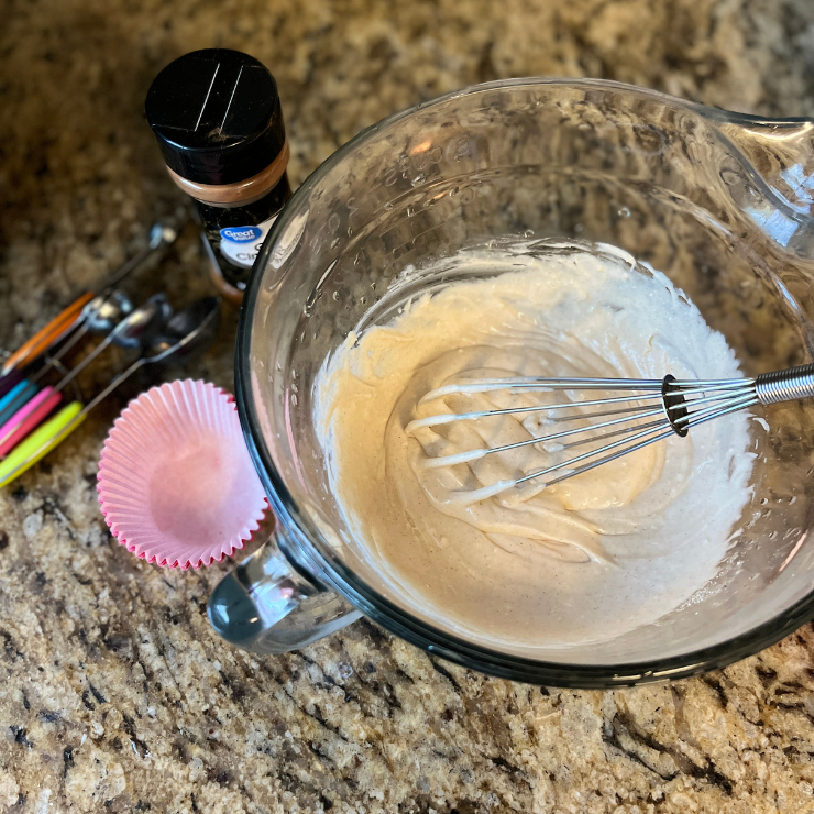 cinnamon muffin batter in mixing bowl