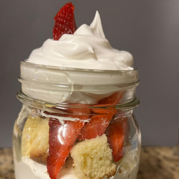 close up of strawberry pound cake mason jar dessert
